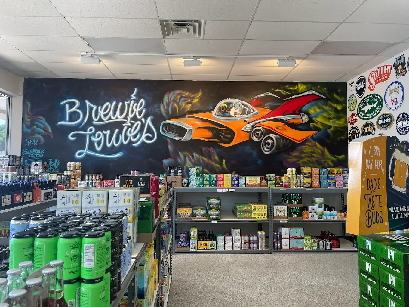 Spaceship mural and beer displays inside Brewie Louie's